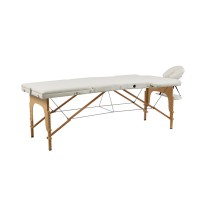 Camilla de estética portátil Sella: Estructura de tres cuerpos de madera ligera ajustable mediante tensores y agujero facial ergonómico Camilla de estética portátil Sella: Estructura de tres cuerpos de madera ligera ajustable mediante tensores y agujero facial ergonómico
